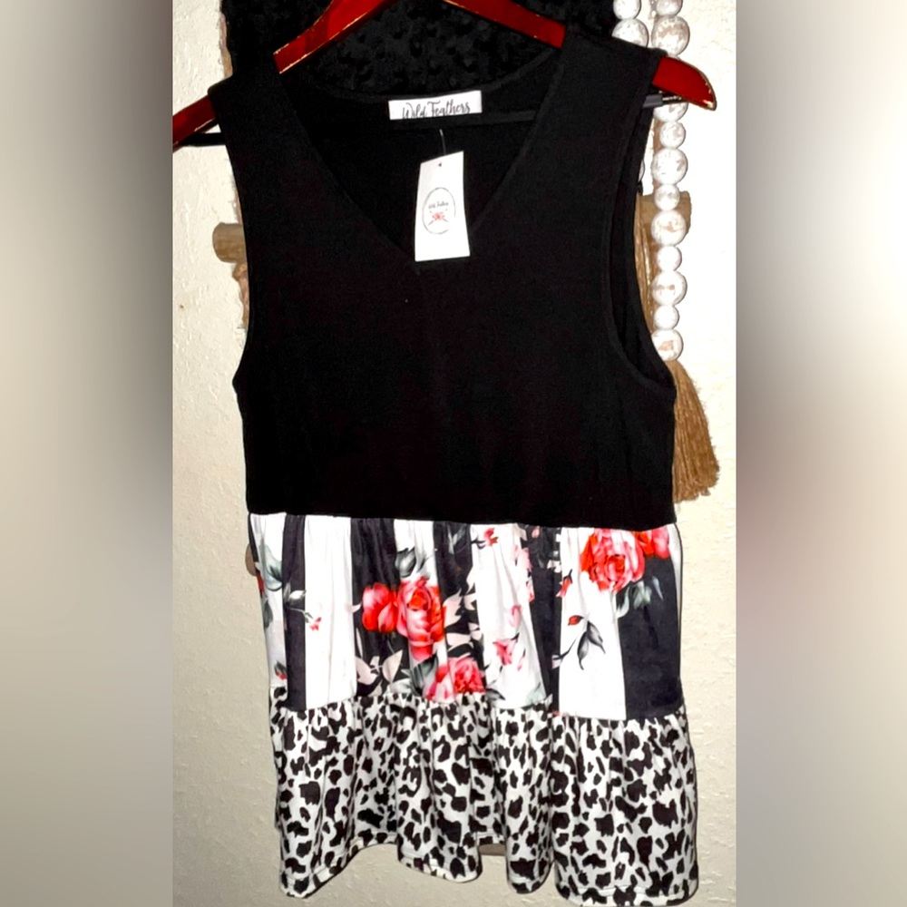 New , sleeveless block colored women’s shirt